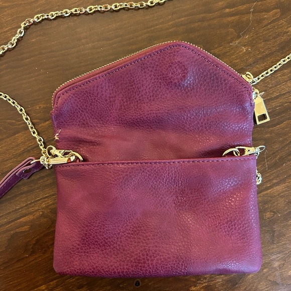 Burgundy Urban Expression Crossbody Vegan leather clutch purse gold detail. - Picture 7 of 10
